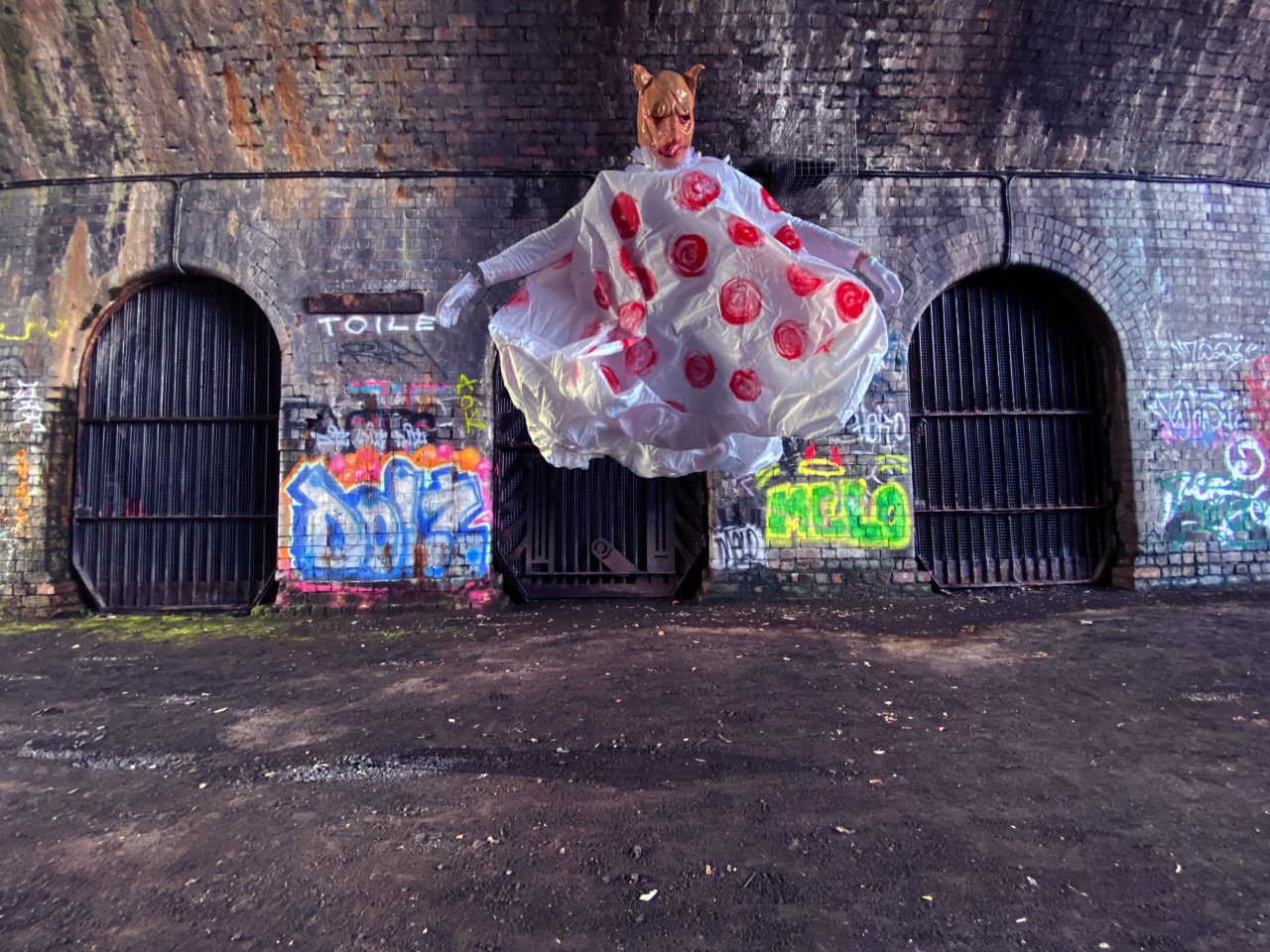 photograph of Birmingham industrial building with suspended figure